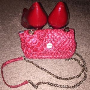 Jessica Simpson clutch with metal chain